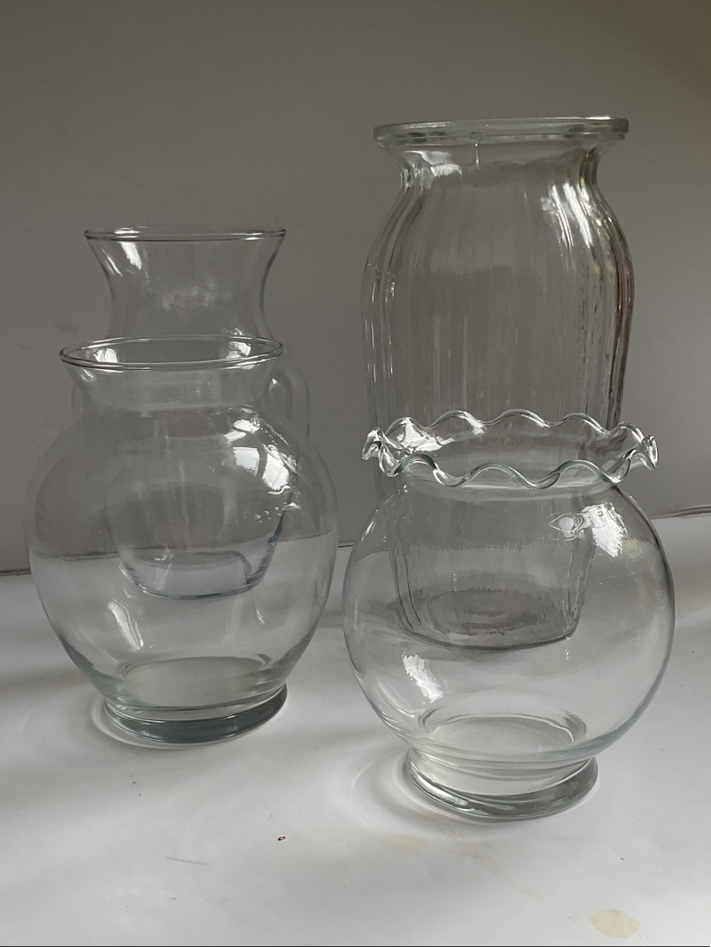 Lot of 4 Lightweight Clear Glass Decorative Vases